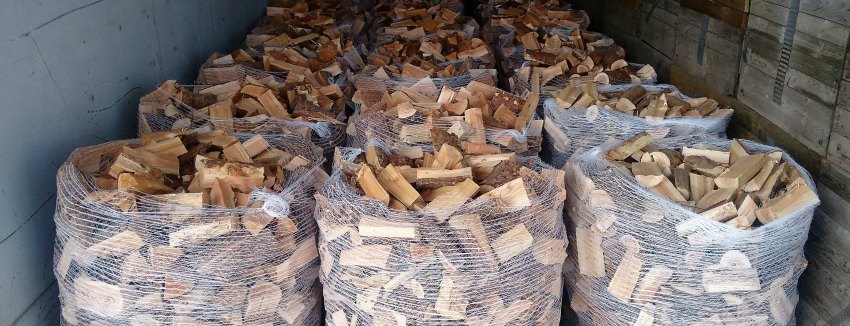 Giant packs of ready to burn softwood in kiln